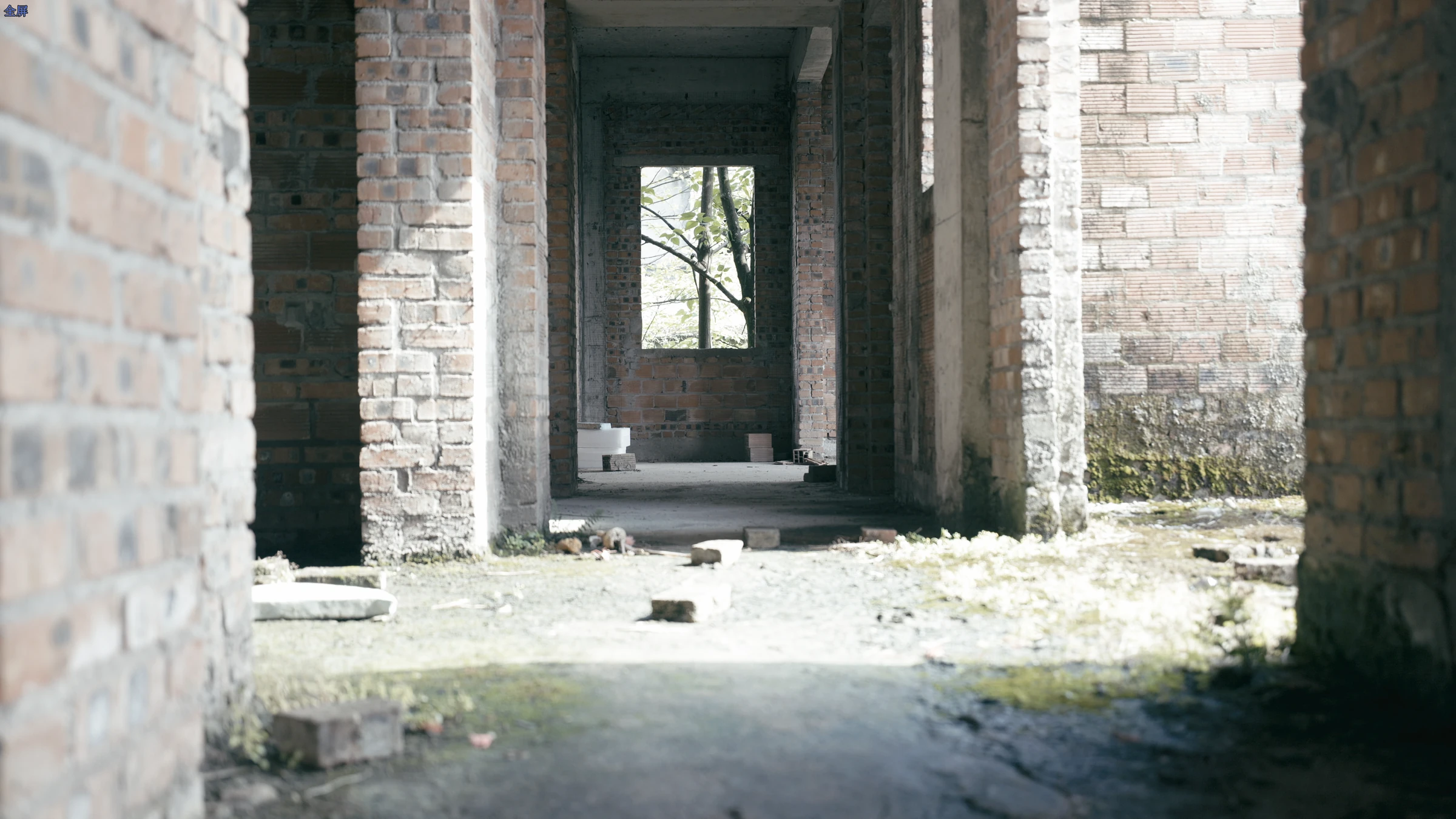 Anonymous, 2025. Sunlight entering an unfinished brick interior.